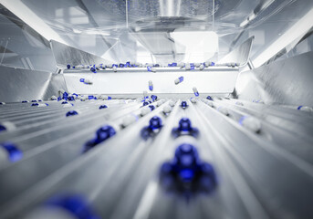 Blue and white capsules sorted in a pharmaceutical processing machine, showcasing manufacturing efficiency. 3d render