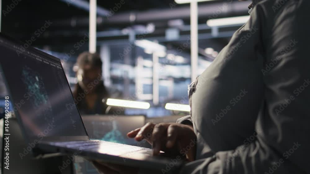 Poster close up of data center engineer using laptop to monitor neural network ai llm visualization. worker