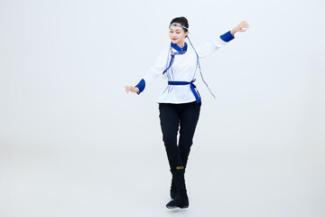 Beautiful dancers performing traditional Chinese folk dance Mongolian dance