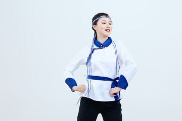 Beautiful dancers performing traditional Chinese folk dance Mongolian dance