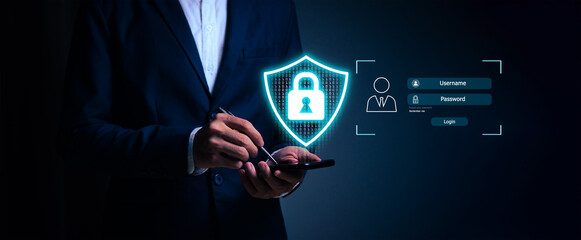Mobile Security Concept: Human hand using a smartphone with a glowing digital shield, padlock icon, and login interface. Symbolizing online data protection, secure access, and user privacy.