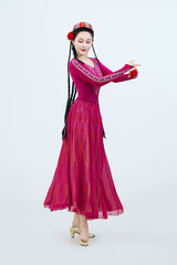 Beautiful dancers performing traditional Uyghur dance from Xinjiang, China