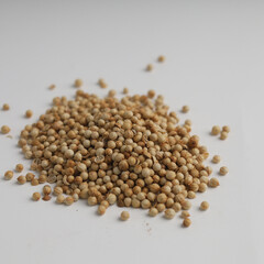 Heap of soybeans on white background