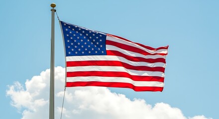 Naklejka premium American Flag Waving in a Clear Blue Sky