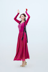 Beautiful dancers performing traditional Uyghur dance from Xinjiang, China