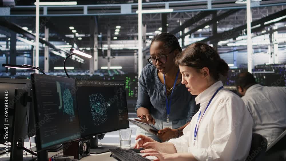 Poster smiling technicians doing fist bump in data center after successful deployment of ai tools. server r