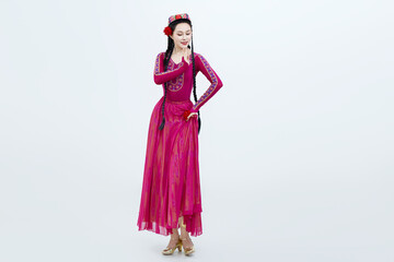 Beautiful dancers performing traditional Uyghur dance from Xinjiang, China