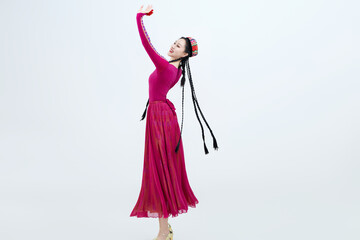 Beautiful dancers performing traditional Uyghur dance from Xinjiang, China