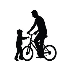Fototapeta premium Father and Son Silhouette Learning to Ride a Bike