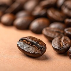 Fototapeta premium Coffee bean on warm taupe background