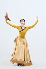Beautiful dancers performing traditional Tibetan Guozhuang dance in Tibet, China