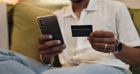 Home, credit card and man with smartphone, hands and financial payment with savings, internet and investment. Ecommerce, online shopping and person with closeup, cellphone and digital app for banking