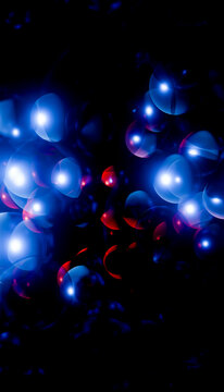 Abstract pattern of glowing blue and red orbs on a dark background. Blender illustration