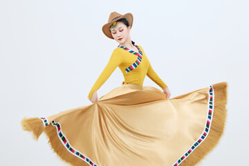 Beautiful dancers performing traditional Tibetan Guozhuang dance in Tibet, China