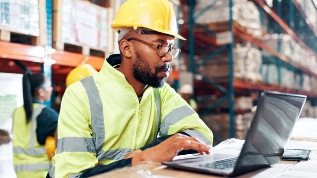 Man, laptop and report for logistics at warehouse with review for order, schedule or inventory management. Person, computer and scroll for shipping, distribution or supply chain at industrial plant