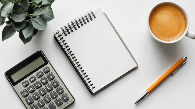 Accounting and financial planning flat lay with notebook calculator mobile phone coffee and pen on white