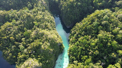 Aerial Drone View of Aljui Bay, Remote Inlet in Raja Ampat, West Waigeo, Indonesia..