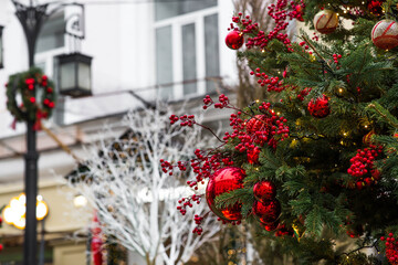 Festive toys on the Christmas tree in Moscow. Beautiful Christmas background. The concept of...
