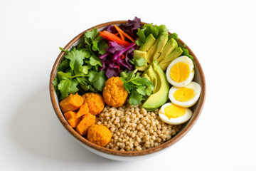 Colorful Buddha bowl filled with grains, vegetables, and protein offers healthy meal option
