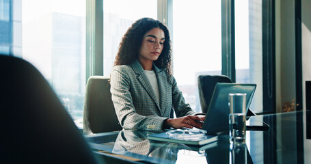 Finance, laptop and serious with business woman in office of investment firm for portfolio growth....