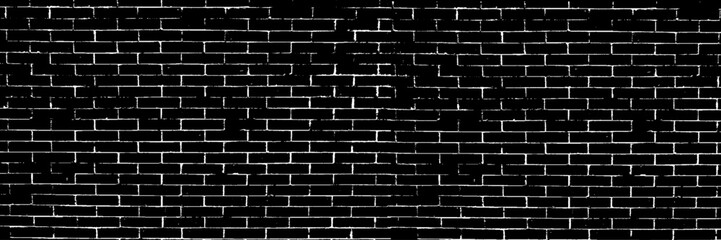 A black and white grungy brick wall. Dilapidated brick pattern in black and white. Dark brick wall background. 