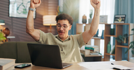 Man, laptop and fist pump with celebration in home with goal, winning or documents for investment....