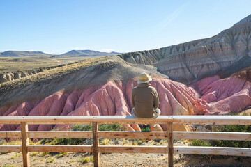 Tourist on colorful hills
