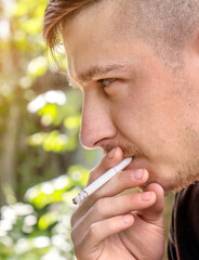 Young Man is smoking