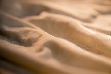 Fototapeta premium Image of Softly Lit Light Beige Fabric Texture