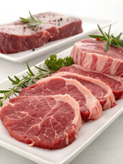 Fototapeta premium raw beef steak with rosemary
