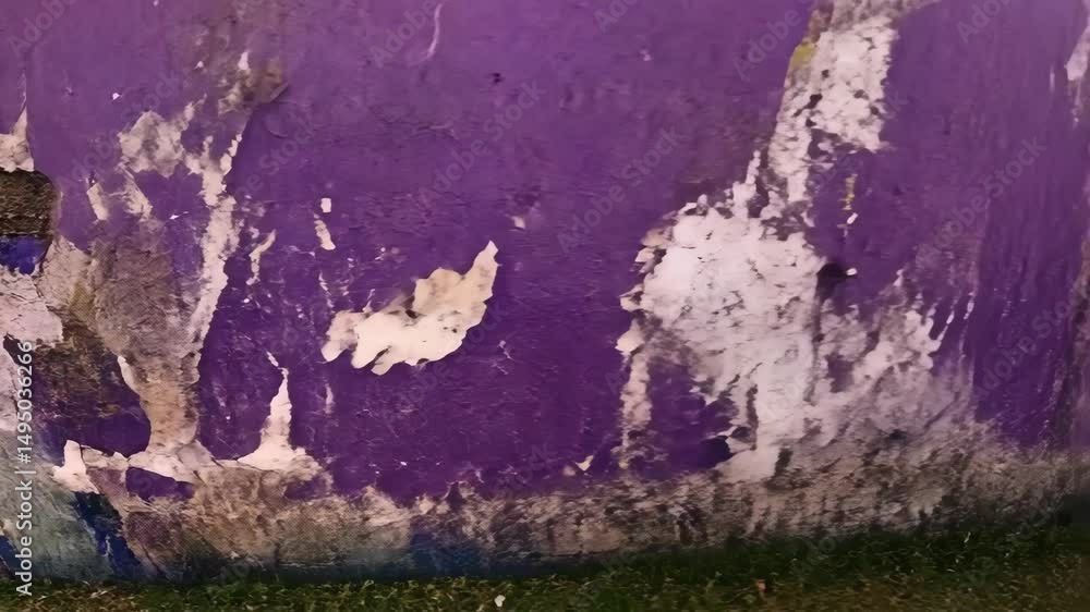 Poster purple painted wall with peeling paint showing various textures and abstract patterns outside