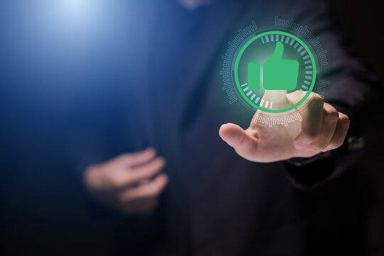 Man using smartphone or tablet, pointing finger at like button, thumbs down button, Interface,Thumbs up icon, display screen, touch screen, Virtual Image Technology
