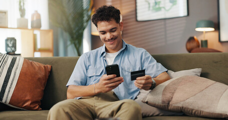 Home, online shopping and man with smartphone, card and payment for digital product, sale and...