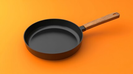 Black frying pan with wooden handle on orange background