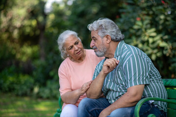 Indian senior couple having in Disrespect, Disowned, Discomfort, Sad depression and bad news....