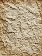 Obraz premium Crumpled brown paper texture. Vintage, aged background ideal for design projects, websites, and print materials. Perfect for adding a rustic or antique feel.