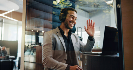 Businessman, laptop and wave in office for video call, planning and privacy cubicle. Hybrid work,...