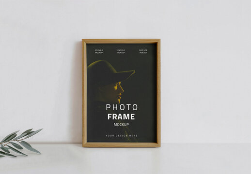 Vertical poster art with wooden frame mockup