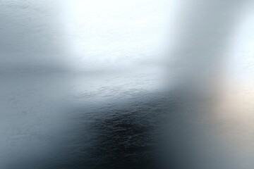 Fototapeta premium Subtle yet dynamic, the silvery surface catches and reflects light, suggesting movement and depth, an image that's soft and engaging.