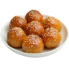 Golden Fried Sweet Dough Balls Coated with Sesame Seeds on a White Plate for Delicious Dessert or Snack Ideas