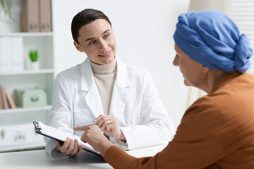 Senior woman with cancer visiting oncologist in clinic