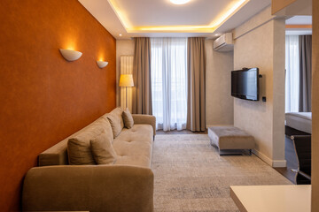 Contemporary hotel interior with a soft and inviting couch