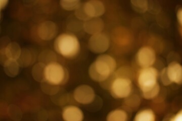 Obraz premium Abstract blurred golden lights creating a warm, inviting atmosphere