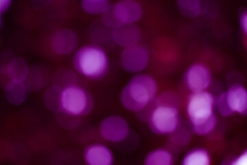 Abstract purple and violet bokeh lights creating a soft and dreamy ambiance