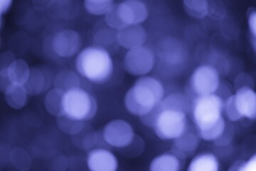 Naklejka premium Dreamy bokeh background in trending very peri color of 2022 year
