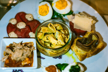 Social food during an italian aperitivo. First comes the picture than the post, in the end you can eat.	

