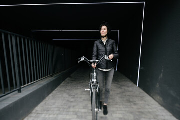 Woman riding a bicycle in a city