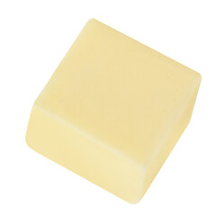 Flying Butter cube isolated on white background. Fresh cow’s milk butter piece close up. Package design element..