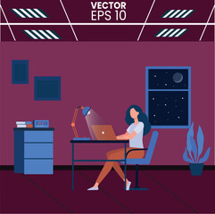 A women doing working on computer and laptop while sitting on chair.