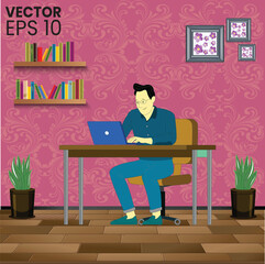 A man doing working on computer and laptop while sitting on chair.